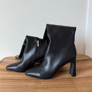 Sleek Black Heeled Boots